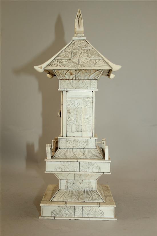 A Japanese ivory veneered model of a shrine, early 20th century, 32.5cm, wood stand